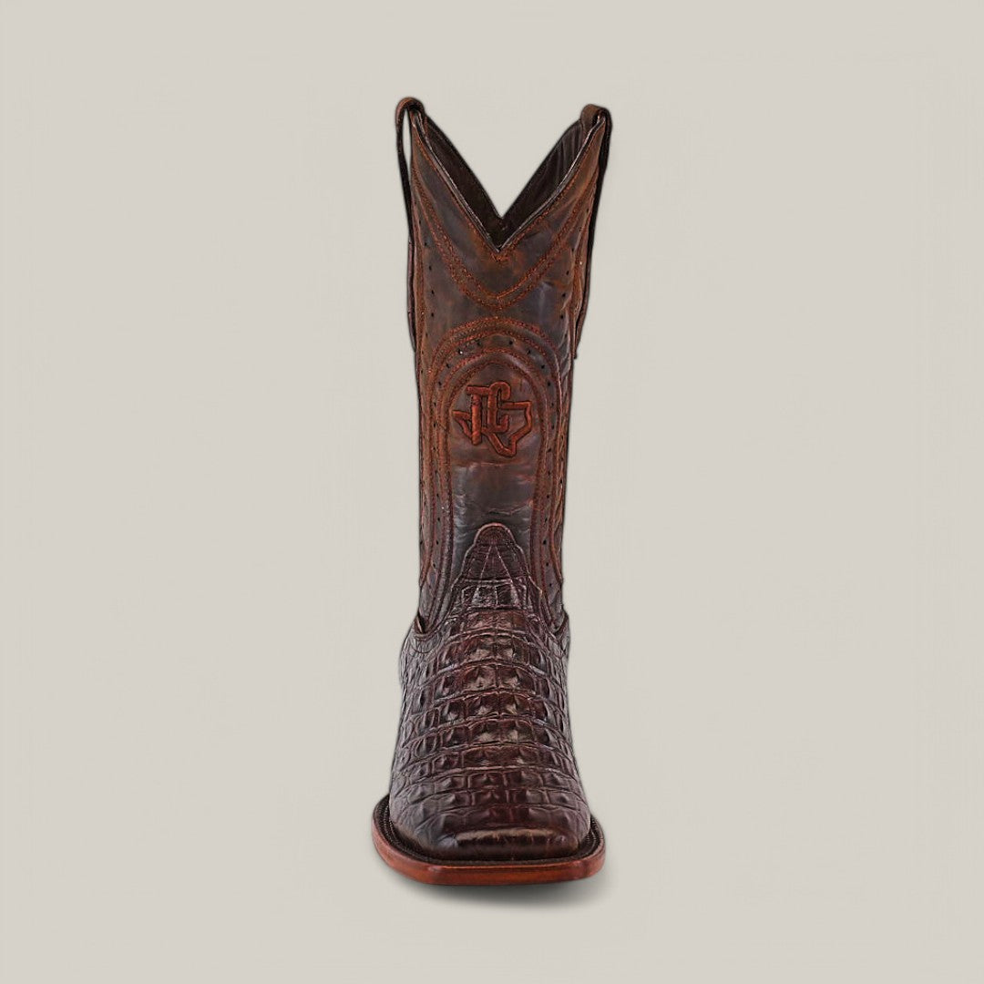 A single Alligatoar Horn Back Print Brown cowboy boot with intricate stitching and embossed shaft design features a square toe and textured crocodile-patterned leather, centered against a plain, light background.