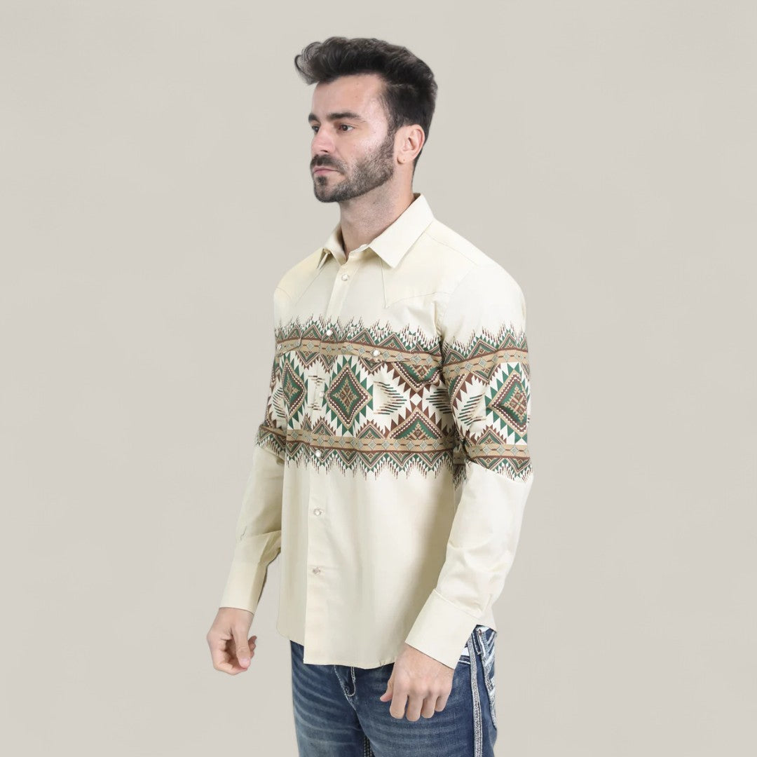 A man wears the Mens Western Modern Fit Cotton/Spandex Long Sleeve Beige Shirt with Snaps (WPL10677), featuring a modern fit, paired with blue jeans, standing against a plain light background.