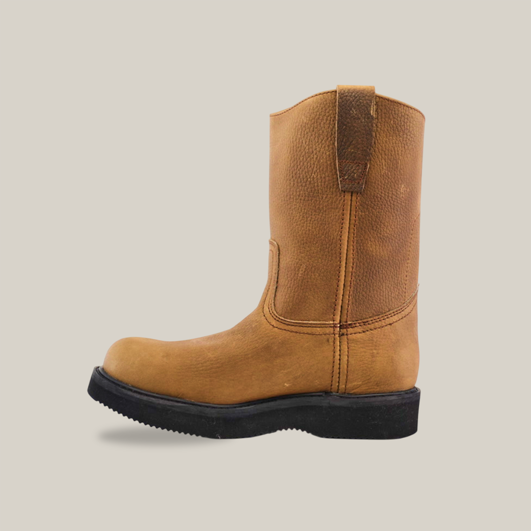 The Tan Roper - Laredo Sole - Soft Toe is a tan mid-calf leather boot made from premium cowhide, featuring a round toe and the signature Tan Roper Laredo Sole. Displayed in profile against a plain white background, the boot has minimal stitching, a slight heel, and embodies classic work boot style.