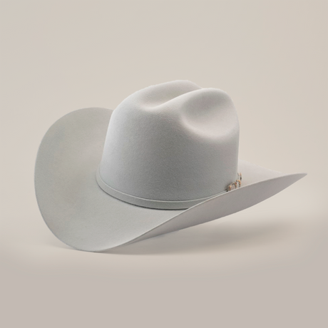 A light gray cowboy hat with a wide brim and a decorative band, displayed against a plain, light background.