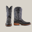 A pair of Lizard Print Black cowboy boots is displayed on a white background. The left boot faces forward, the right shows its detailed stitching and patterns. Made from premium cowhide leather with slip-resistant wooden soles, they flaunt a polished finish for elegance.