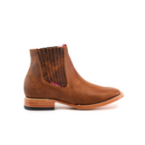 The Avejentado Honey square Toe is a brown leather ankle boot with subtle stitching, featuring a low wooden heel and side elastic panels. Its squared-off pointed toe and avejentado honey finish make it perfect for the cowboy scene.