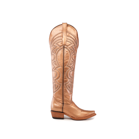 The Taylor Rose Gold features a single tan leather cowboy boot with intricate stitching, a snip toe, and stacked wooden heel. Its tall shaft stands upright on a white background, highlighting its elegant craftsmanship.