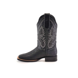 A single Cheyenne Black Square Toe boot, seen from the side, features intricate stitching, a sleek square toe, and is crafted from premium leather. It showcases traditional Western style with a low heel and decorative shaft patterns.