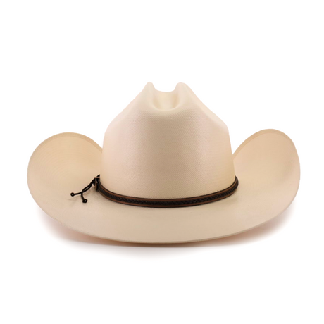 The 1000X Country Straw Hat is a beige cowboy hat, made from high-quality materials, featuring a wide brim and a decorative brown band. The prominent crease on its front adds to its classic charm against the white background.