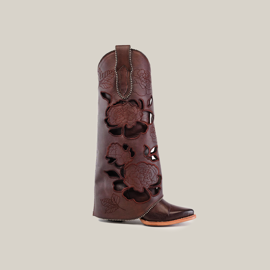 Side view of a Roma Flowers Tall Shaft Chocolate boot featuring intricate floral cutouts. Part of the Platinum Collection, it has stitching along the top and foot, a slightly pointed J toe, and a contrasting light brown sole.