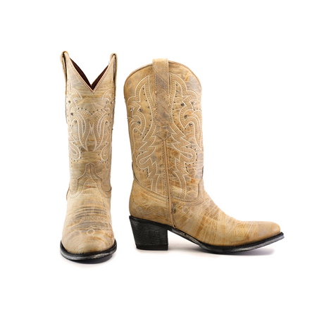 The Cowhide Hortus Rustic White boots, with a mid shaft and round toe, are crafted from cowhide leather in light brown. Showcasing intricate stitching, the left boot angles forward and the right displays its side profile with a moderately sized black heel. They offer timeless craftsmanship for any collection.