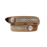 The Ariat Western Mens Belt, model A1013248, features a stylish brown leather basketweave with floral silver conchos. Its intricate beadwork in blue, white, and tan geometric patterns showcases rugged elegance and reflects Western heritage. Coiled to highlight its design.