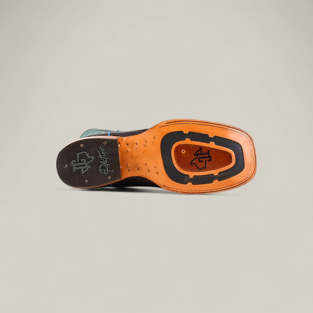 The image displays the sole of an Exotic Caiman Horn Back - Dark Brown - Square Toe boot, featuring leather and rubber construction with a signature logo and initials by the heel, set against a plain light background.