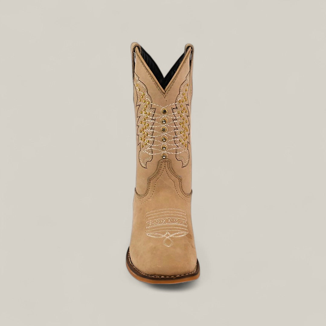 The Orion Suede Bone - Square Toe Kids Boots are tan, crafted from premium suede with decorative white and yellow stitching on the shaft and toe, shown from the front against a plain light background.