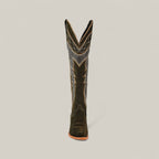 A single Della Olive Green tall shaft snip toe boot with decorative stitching stands upright, viewed directly from the front, against a plain light background.