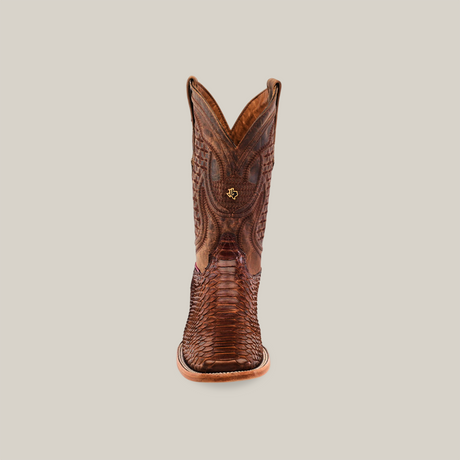 The Exotic Python - Brown - Square Toe boot features single Python leather with intricate patterns, a small star on a slightly curved top edge, and is presented against a plain beige background.