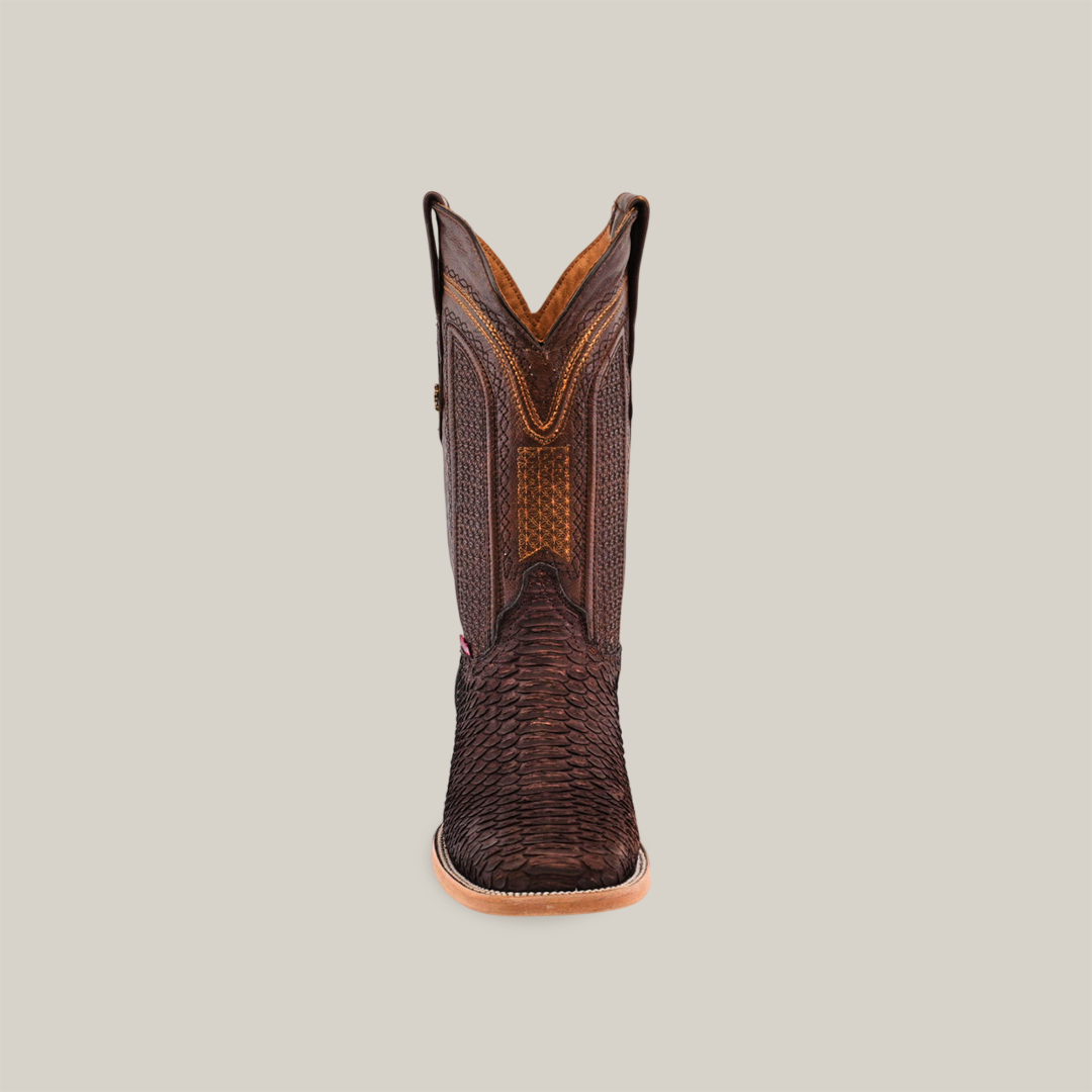 An Exotic Python - Matte Brown boot, featuring a textured dark brown leather with intricate patterns and a tall upper section. The boot has a square toe and light-colored sole, set against a plain off-white background.