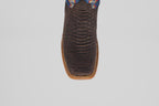 A close-up top view of the Morgan - Matte Brown - Square Toe men’s boot, showing its textured matte brown finish, detailed stitched edge, and a hint of colorful design near the upper.