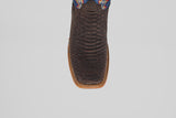 A close-up top view of the Morgan - Matte Brown - Square Toe men’s boot, showing its textured matte brown finish, detailed stitched edge, and a hint of colorful design near the upper.