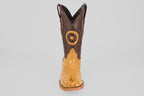 The Exotic Full Quilt Ostrich - Fawn - Square Toe boot features a tan ostrich foot, dark brown shaft, and a star emblem patch, offering timeless cowboy style with premium craftsmanship.