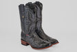 A pair of Exotic Full Quilt Ostrich boots in black with round toes and textured leather, featuring decorative stitching and brown wooden soles, displayed against a plain light gray background.