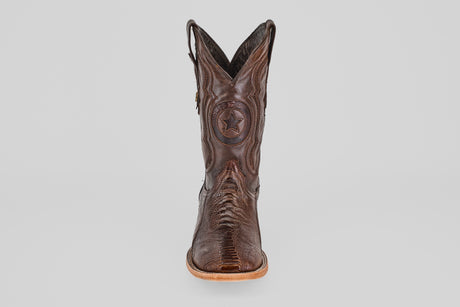 The Austin Leg - Brown - Square Toe is a single brown western boot with decorative stitching, a star emblem on the front, and a light-colored sole, photographed on a plain white background.