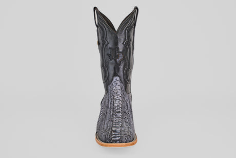 The Austin Leg - Blue Jean - Square Toe men's cowboy boot features a textured, reptile-like pattern and a light brown sole, displayed from the front against a white background—ideal for matching with blue jeans.