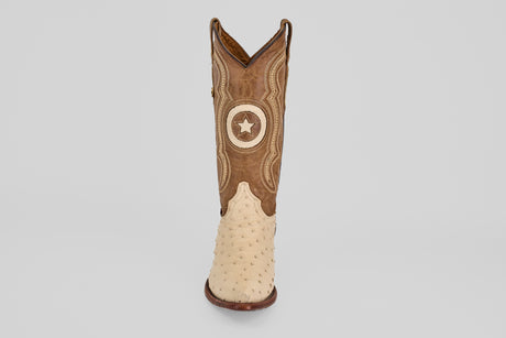 The Austin - Bone - Snip Toe cowboy boot features a tan ostrich leather foot, brown upper with decorative stitching, and a circular star patch, shown against a plain white background.