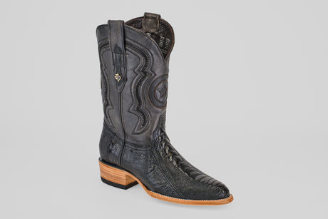 The Austin Leg - Black - Roper Toe boot features decorative stitching, a pointed toe, wooden heel, and pull straps, displayed against a plain light gray background.