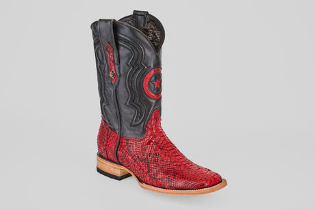 A single Tanner - Ruby - Square Toe boot with a black upper featuring a red star and a textured Python Rojo snakeskin lower, displayed on a plain light gray background.