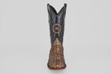 The Tanner - Rustic Bone - Square Toe cowboy boot features a brown snakeskin-textured lower, black upper shaft, and a decorative star emblem on the front—reflecting Western craftsmanship and the allure of exotic leather.