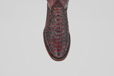 A close-up, top-down view of the round toe of the Tanner Jumbo - Black Cherry cowboy boot in textured Python leather, shown against a plain white background.