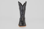 A single Tanner - Black - Square Toe cowboy boot in Python Negro leather, featuring decorative stitching and a wooden sole, is shown from the front against a plain light background.
