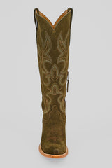 The Allison Agave - Tall Shaft - Snip Toe is a single brown suede western boot with decorative stitching, a pointed toe, a light tan sole, and a tall shaft, shown facing forward on a plain white background.