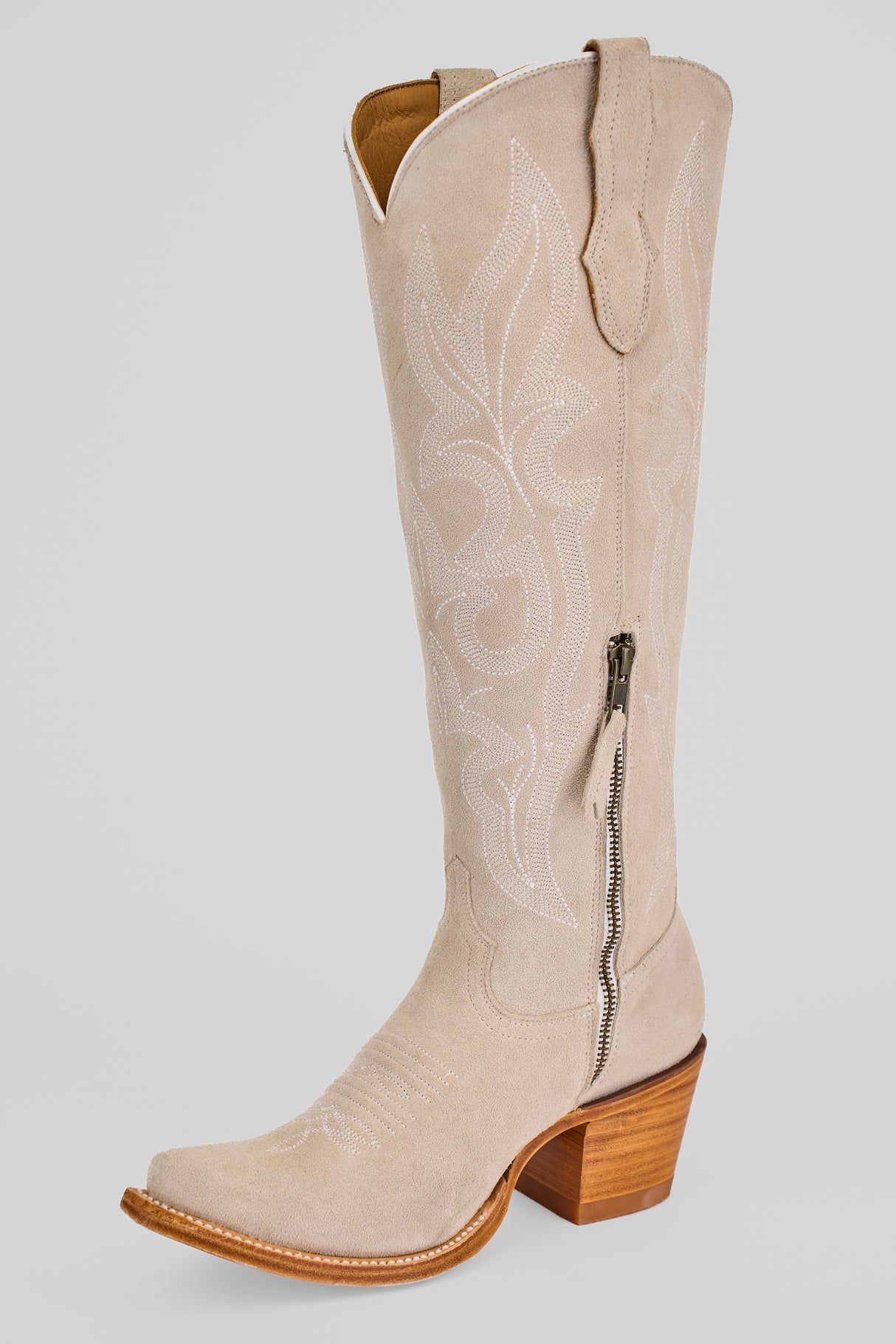 The Allison Ivory - Tall Shaft - Snip Toe is a women's western boot in light beige with white stitching, a tall shaft, side zipper, pull tabs, snip toe, and stacked wooden heel, shown on a plain white background.