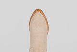 A top-down view of the Allison Ivory - Tall Shaft - Snip Toe boot highlights its ivory color, snip toe, white decorative stitching, and brown leather trim, exemplifying classic women's western boot style.