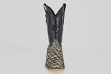 The Conor - Rustic Bone - Square Toe men's cowboy boot features a black leather upper and textured, scaly tan fish leather lower section, shown from the front on a plain light gray background.