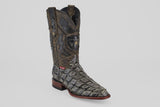 The Conor - Charcoal - Roper Toe cowboy boot for men features a textured dark gray fish leather pattern, brown shaft with intricate stitching, roper toe, and wooden heel, shown on a plain light gray background.