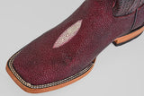 Close-up of Ranger – Wine – Square Toe boots in maroon stingray leather with a textured, pebbled surface, signature pale oval patch on top, and a light-colored stitched sole.