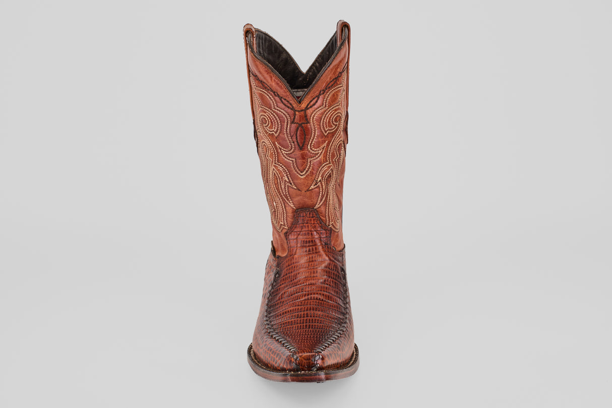 The Lizard Cogñac – Embossed Leather - Versy Toe (E201) boot, shown from the front on a plain light background, features decorative stitching and highlights classic western style.