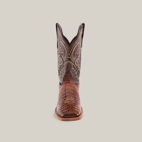 Front view of the handmade Caiman Belly Print Chocolate - Square toe boot, showcasing intricate embroidery and a textured caiman belly print against a clean, light gradient background.