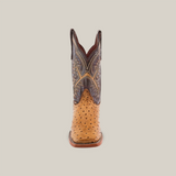 The Karoo Ostrich Print Orix - Square Toe cowboy boot features a textured tan leather foot with a square toe and an intricately patterned dark brown shaft, showcasing high-quality cowhide craftsmanship against a plain white background.