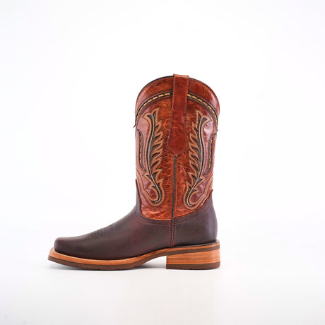 The Azkar Moka boot, crafted from premium cowhide and featuring intricate embroidery, stands out with its slip-resistant wooden sole and rodeo-style toe.