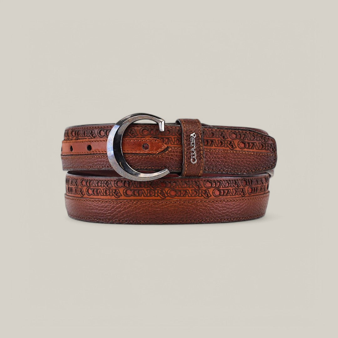 The Honey Laser Belt - BC211 is a brown leather belt featuring a silver buckle, embossed CYERRA text, and textured pattern. This elegant fashion accessory showcases a laser-cut design as it coils gracefully through the buckle on a neutral background.