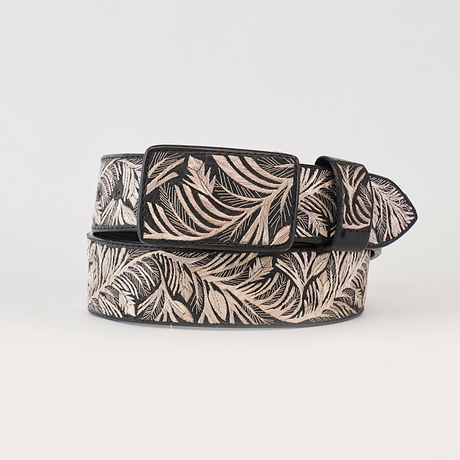 The Artisanal Handmade Silver Belt Branches Deluxe is a stylish black belt featuring intricate beige leaf patterns, subtle silver thread embroidery, and a polished buckle, exuding luxury and artisanal beauty.