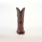 The Exotic Caiman Hornback boot showcases a pointed rodeo toe and a high shaft with exquisite stitching, crafted from brown caiman leather with intricate hornback details, and is displayed against a plain white background.