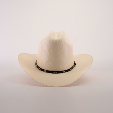 The 500X Dos Carnales Straw Hat, featuring a white design with a black band and small silver accents, showcases style and resilience against a plain white background.