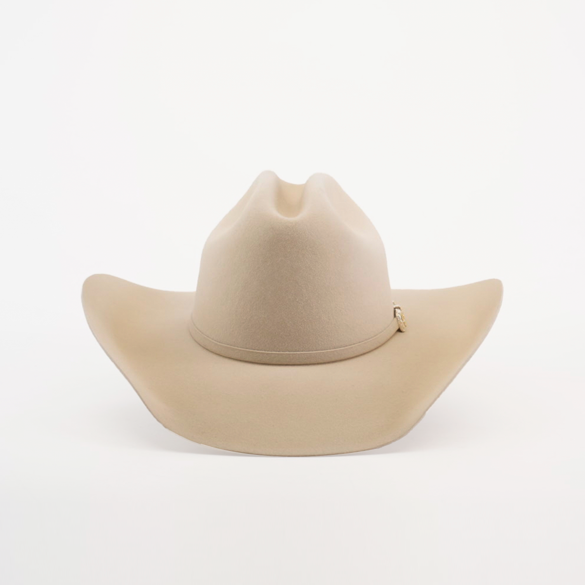 The 100X Tony Lama Belly cowboy hat, a beige symbol of authentic Western elegance, has a wide brim and slightly pinched crown, displayed from the front on a plain white background.