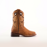 The Matcat Fawn - Square Toe is a single brown cowboy boot crafted from premium leather, showcasing decorative stitching and pull straps. Viewed from the side on a white background, it features expert craftsmanship with a sturdy heel and slightly rounded toe.