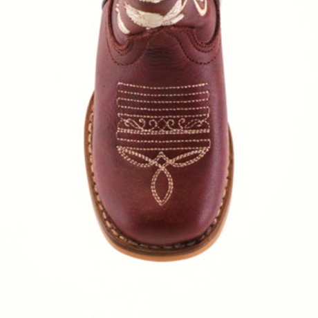 Top view of a Jatziry Cogñac - Square Toe boot features intricate white stitching on the toe against a plain white background, with decorative loops and lines enhancing its exquisite handcrafted leather and highlighting its artisanal craftsmanship.