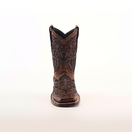 This exquisite Taurine Matte Chocolate - Square Toe boot displays intricate floral patterns on premium leather, highlighting western elegance with its meticulous craftsmanship, all set against a white backdrop.