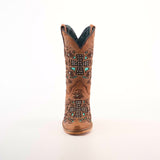 The Alamo Studs Honey -+ Snip Toe is a single brown cowhide leather cowboy boot featuring intricate embroidery with cross and floral patterns, set against a plain white background.