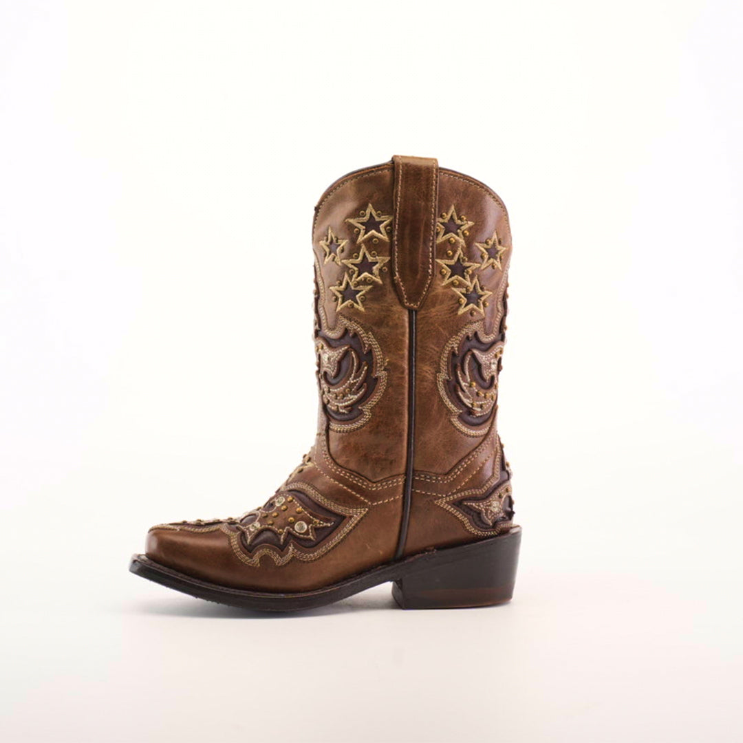 The Chantal Crystals Camel - Snip Toe is a single brown cowboy boot crafted from premium cowhide leather, featuring intricate star and swirl embroidery, complemented by a low black heel. This expertly crafted piece stands against a plain white background.