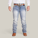 A person in a white shirt, Western Blue Straight Fit Embroidered Jeans - W430, and brown textured cowboy boots stands against a plain background. The look is completed with a large decorative belt buckle and brown leather belt, showcasing classic Western style.